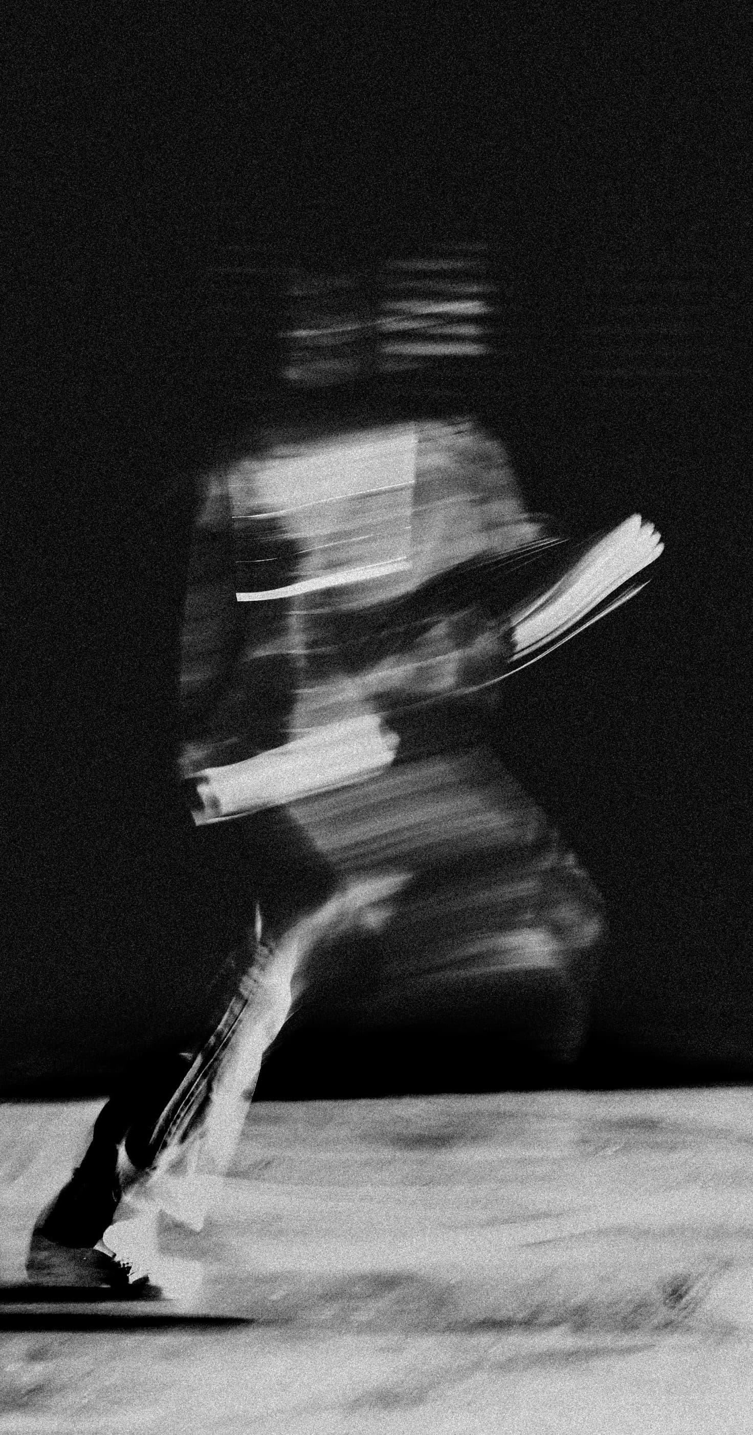 Athlete sprinting outdoors during a training session